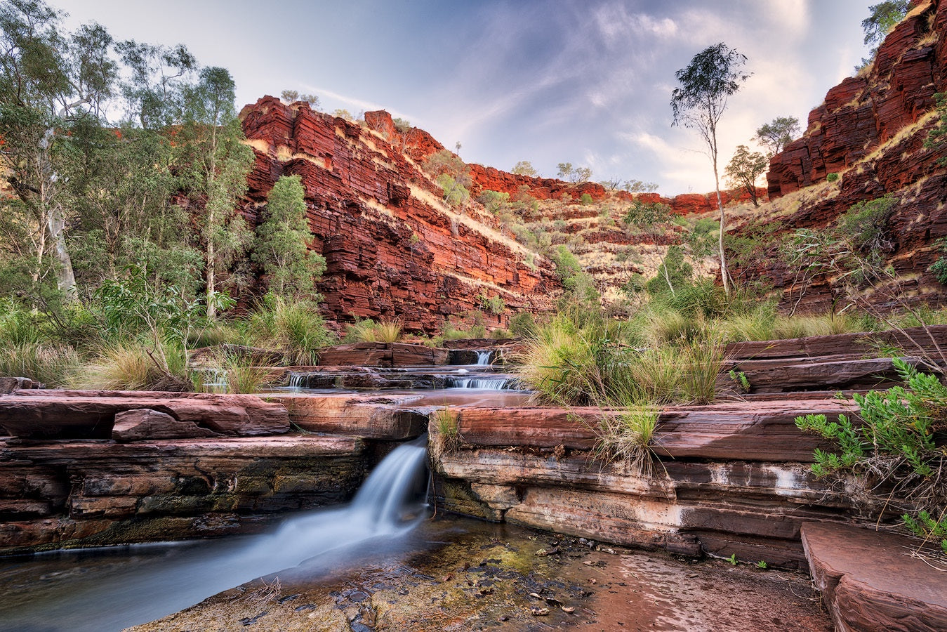 Stunning image of waterfall and rock formations at Kalamina Gorge in Karijini National Park