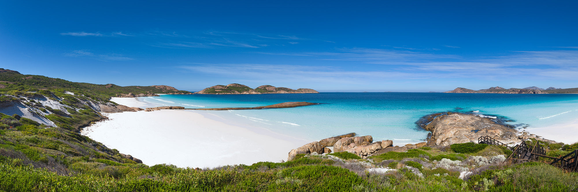 Overlooking the second and third bays at Lucky Bay Esperance crisp white sand and aqua water panorama